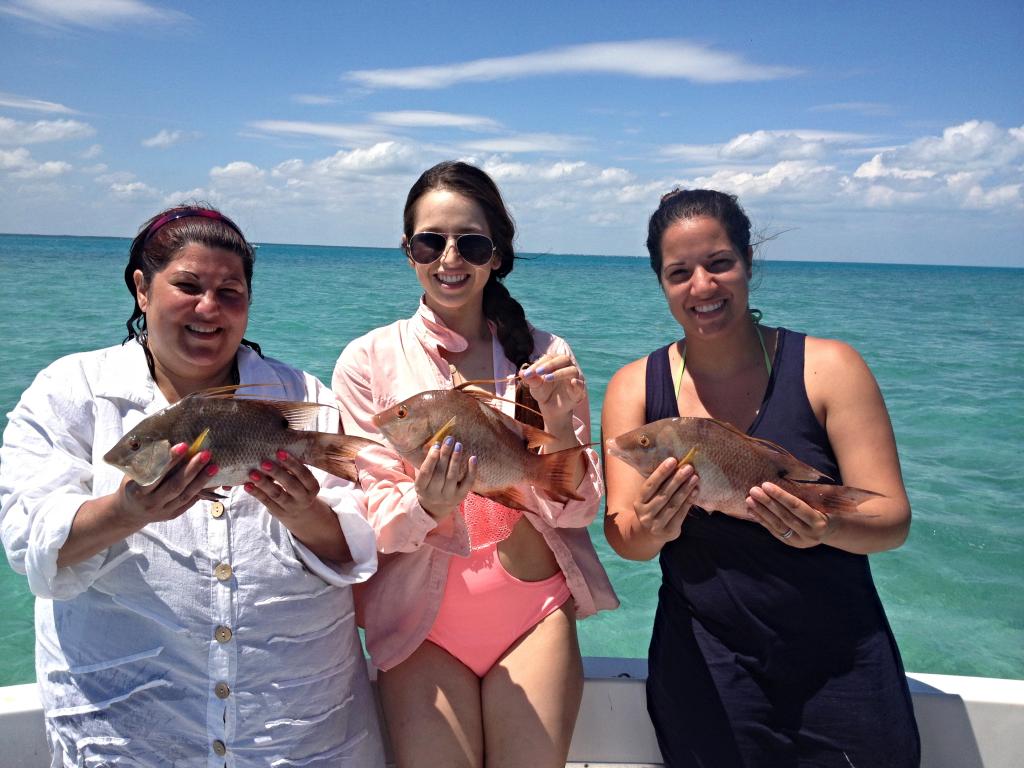 3-women-anglers-holding-some-hogfish